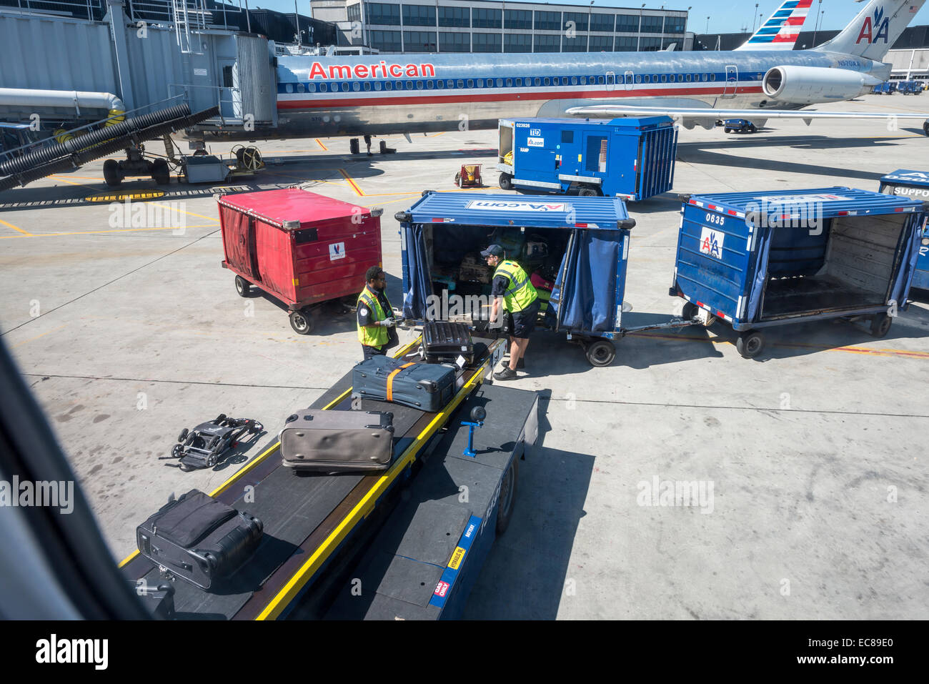 luggage loading on plane,america,usa,airport,chicago Stock Photo