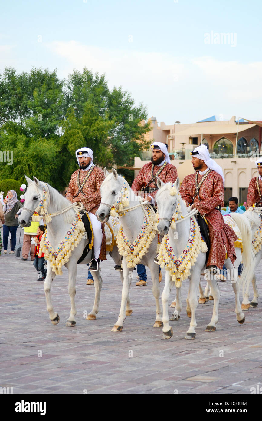 Qatar Emiri Forces are performing military horse ride marches in Doha, Qatar. The event was held on Qatar National Day Stock Photo