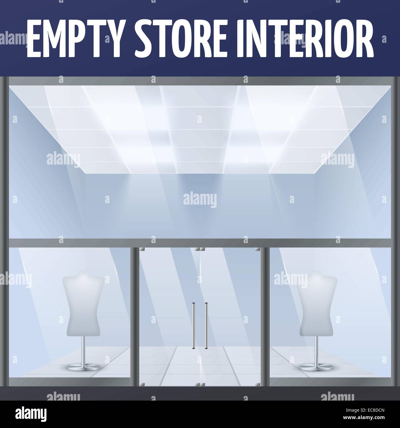 Illuminated empty department store building interior with dress forms ...