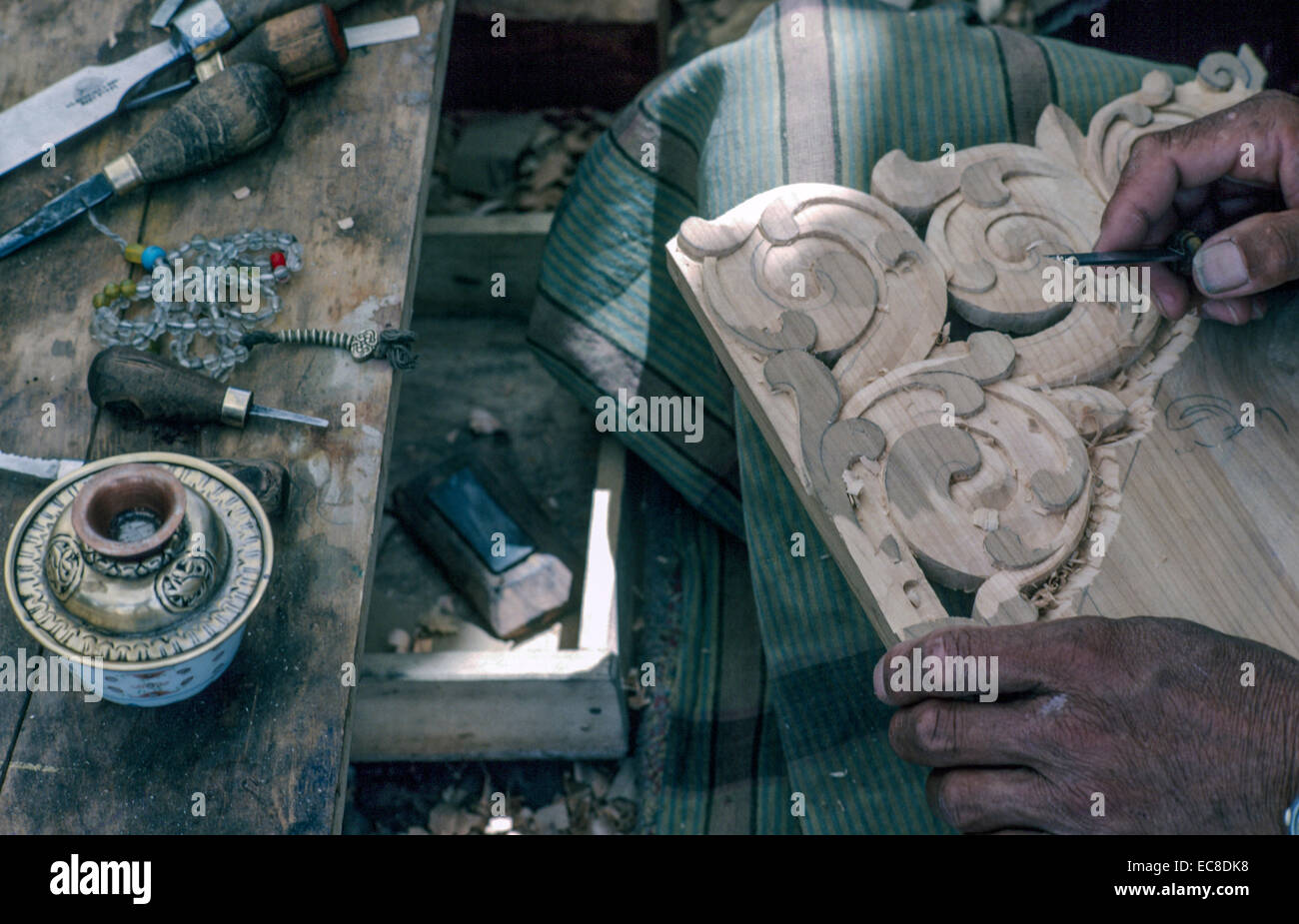 Ladakh Tibet wood carving detail workshop hands decorative tools ...