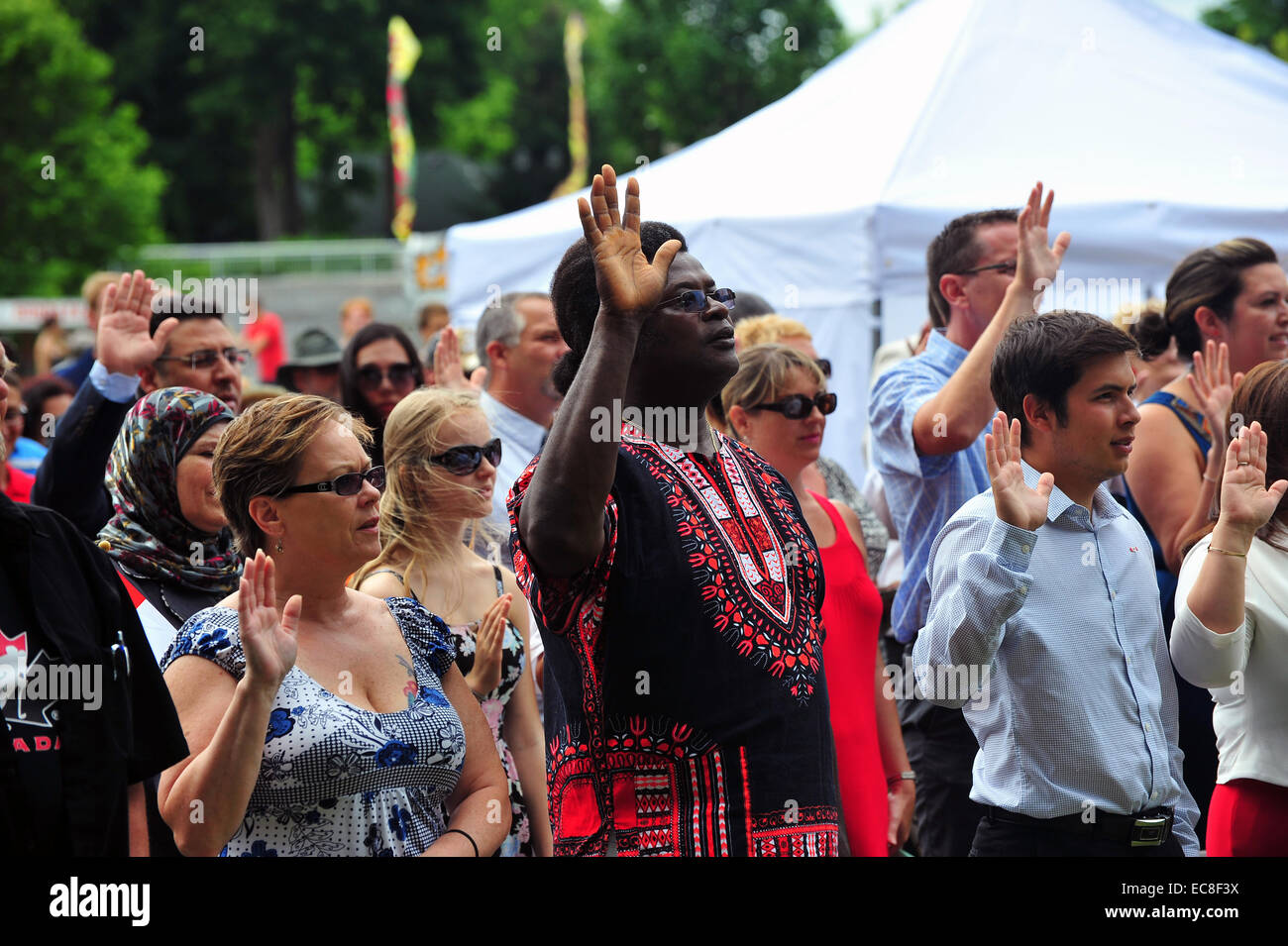 'People swear allegiance to Canada during a Canadian citizenship ceremony held on Canada Day. Stock Photo