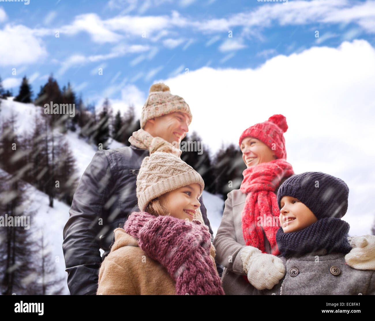 happy family in winter clothes outdoors Stock Photo - Alamy