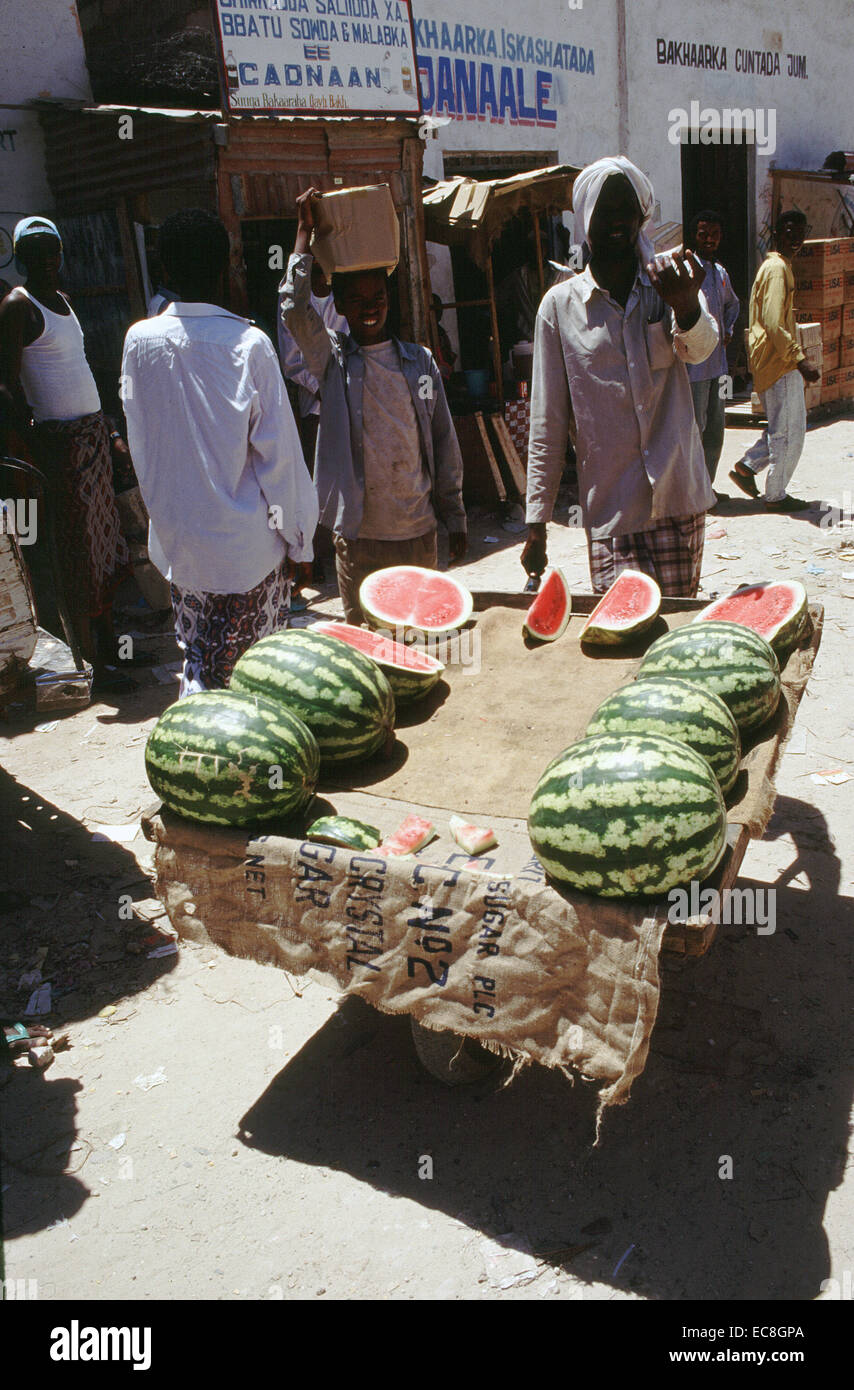 Somali man selling Water melons in Mogadishu Somalia circa 1994 Stock Photo