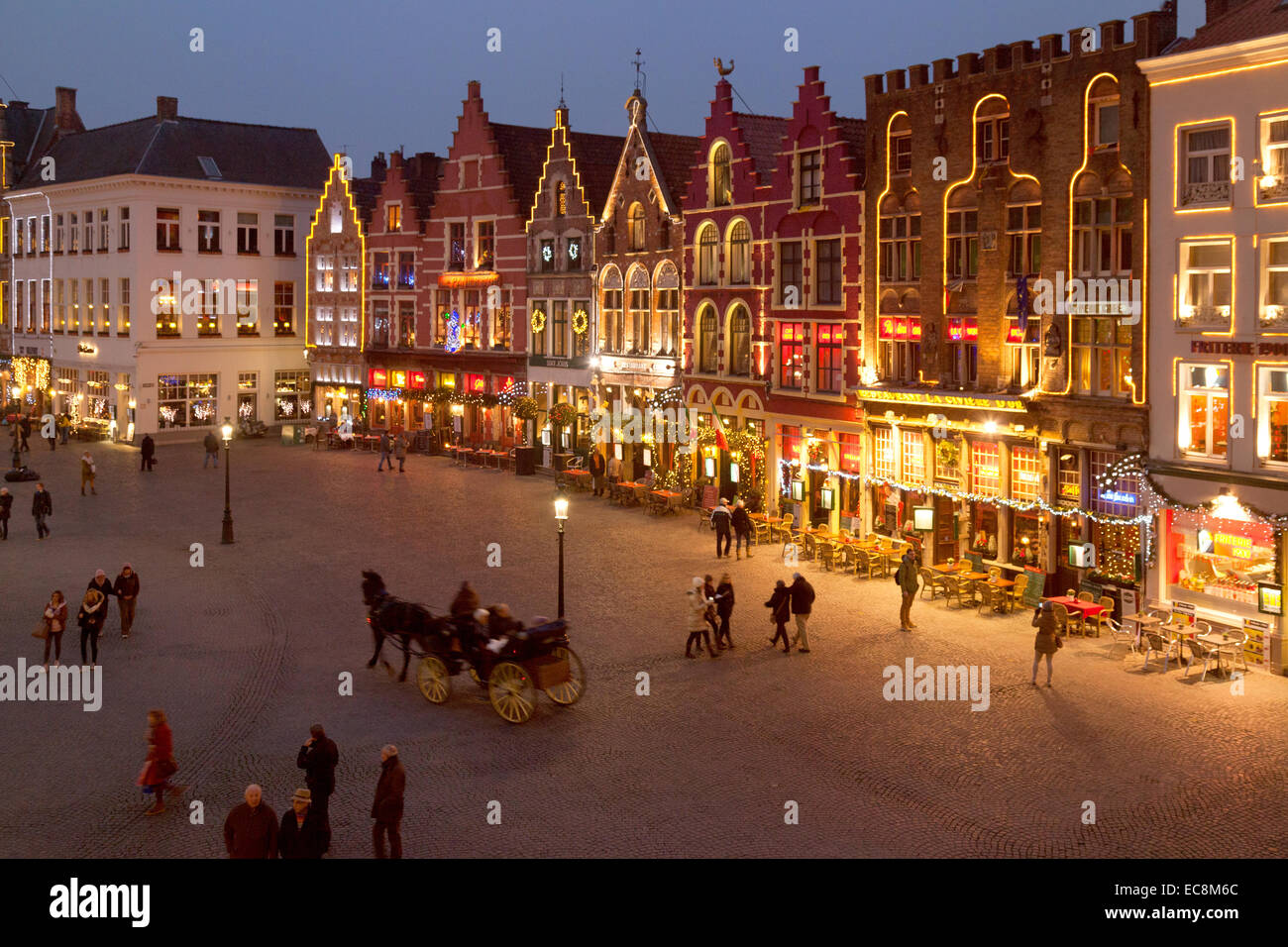 Bruges Belgium city centre at dusk, Christmas in the Market ( Markt ) Square, Bruges Belgium Europe Stock Photo
