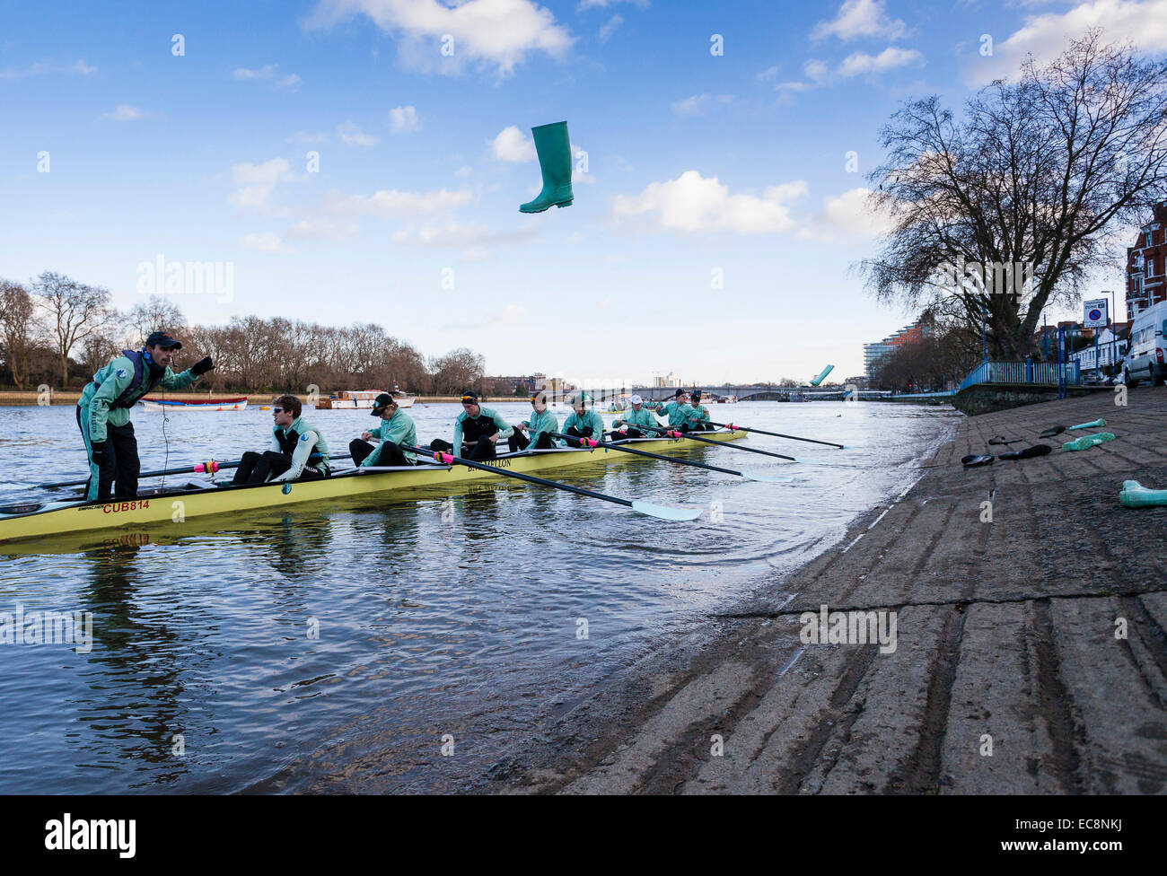London, UK. 10th Dec, 2014. The Boat Race Trial VIIIs. Cambridge University Boat Club trials. A welly is thrown to shore in preparation for launch Credit:  Action Plus Sports/Alamy Live News Stock Photo