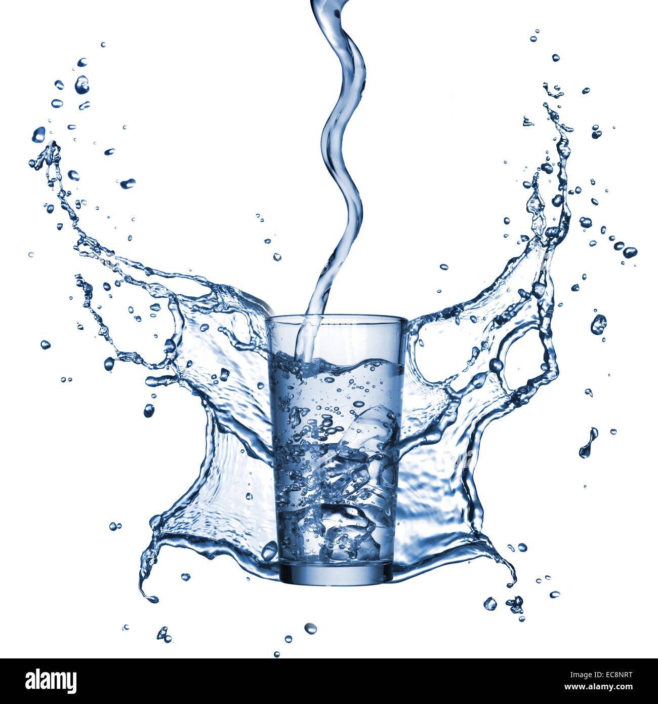 water pouring into the glass with splash isolated on white Stock Photo