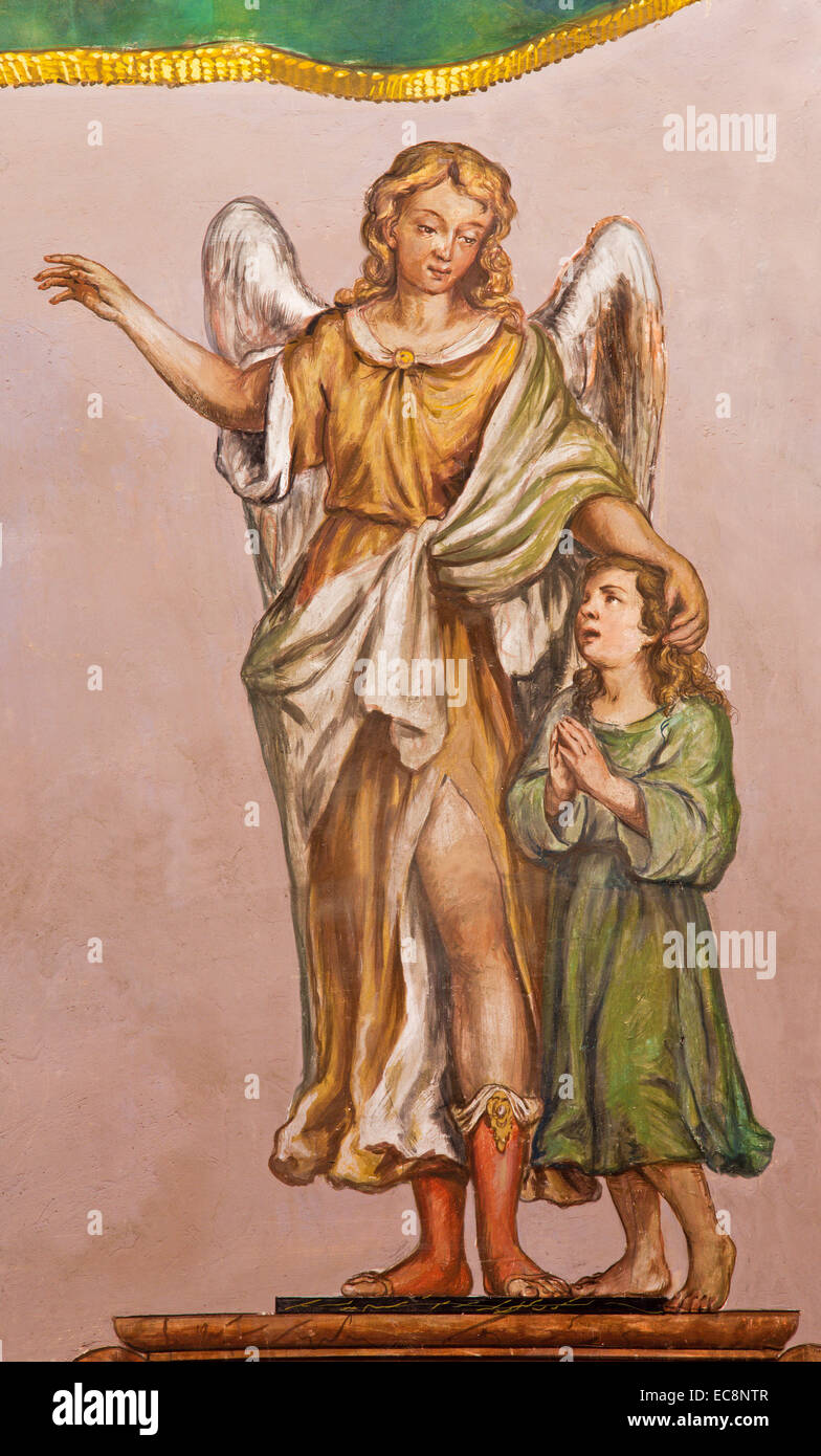 Seville - The baroque fresco of guardian angel  in church Hospital de los Venerables Sacerdotes Stock Photo