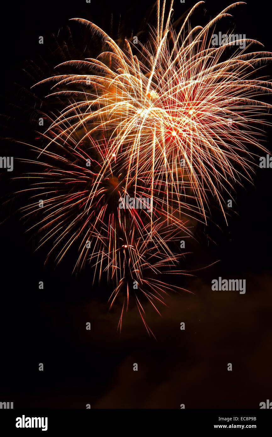 A vertical image of a fireworks display for Canada Days Stock Photo