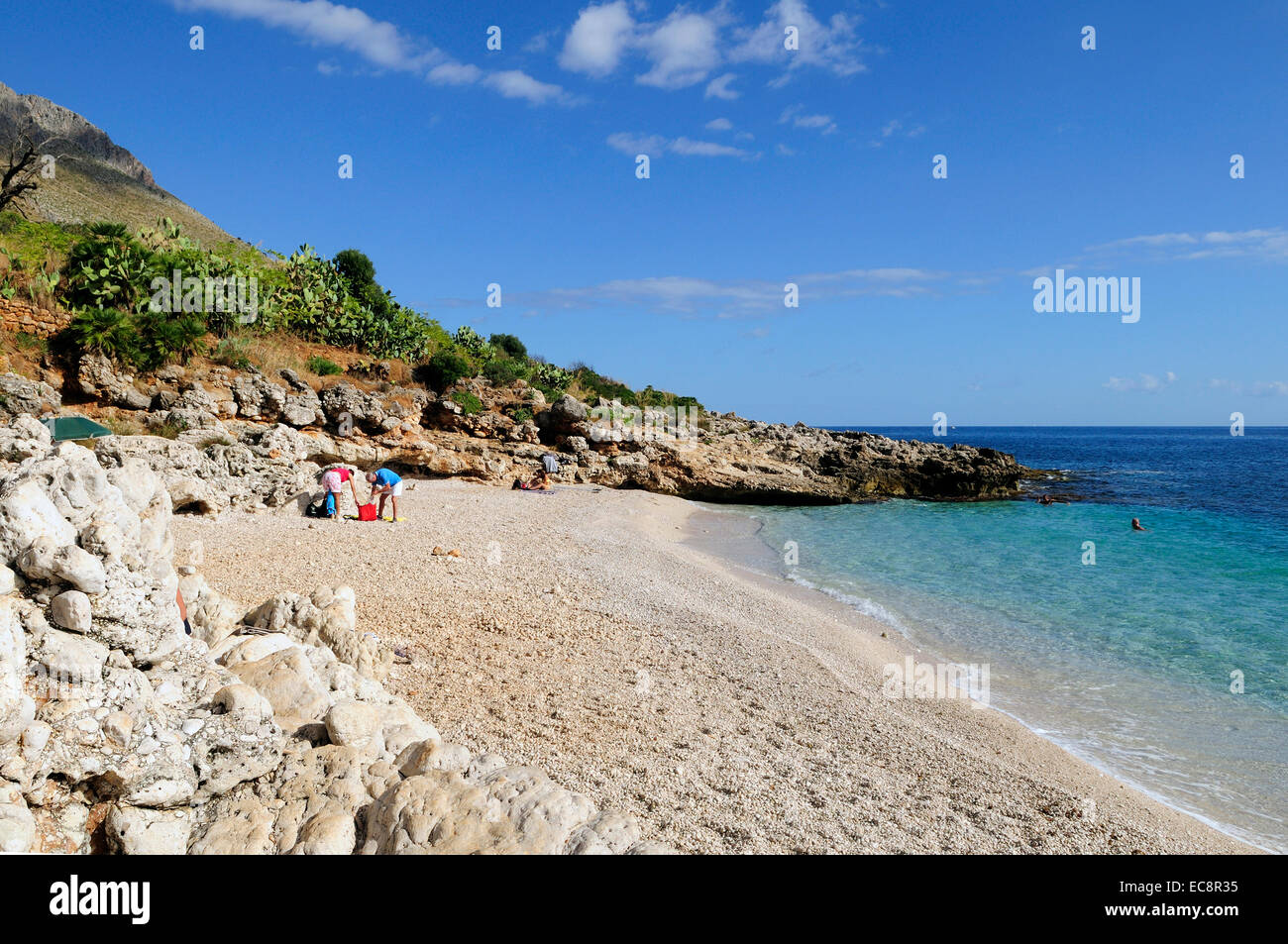 Isolated cove beach of Cala dell'Uzzo, into Riserva Naturale dello Zingaro [ Zingaro nature reserve ] near Scopello , Sicily. Stock Photo