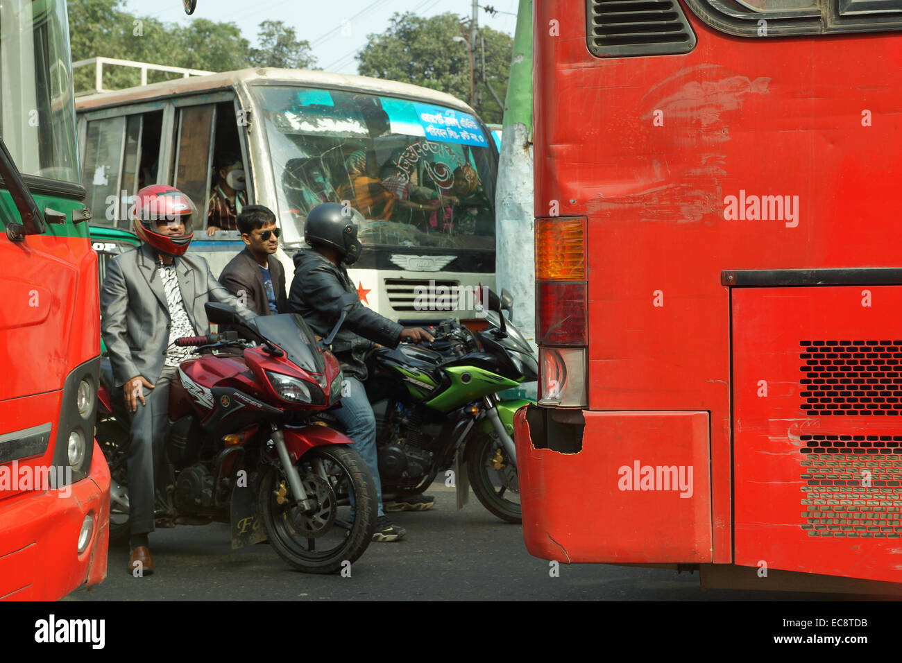 bike riders in a traffic jam in dhaka, bangladesh Stock Photo