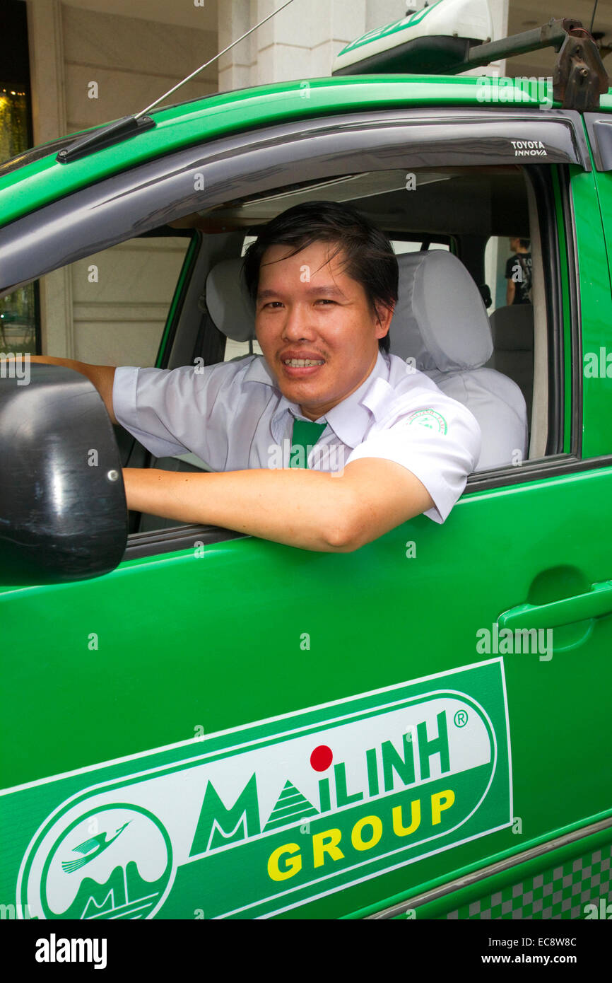 Mai Linh taxi and driver in Ho Chi Minh City, Vietnam. Stock Photo