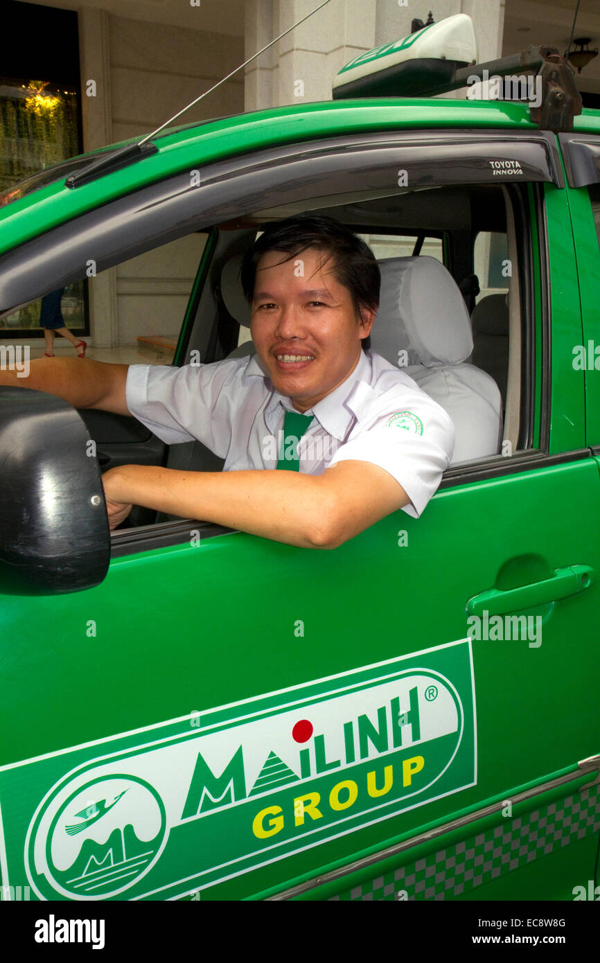 Mai Linh taxi and driver in Ho Chi Minh City, Vietnam. Stock Photo