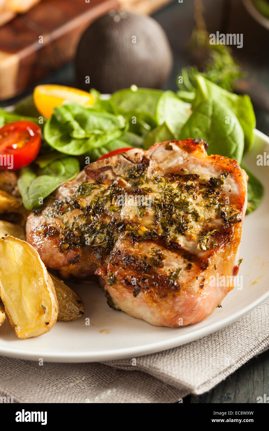Large Grilled Pork Chop with Basil Lemon Seasonings Stock Photo
