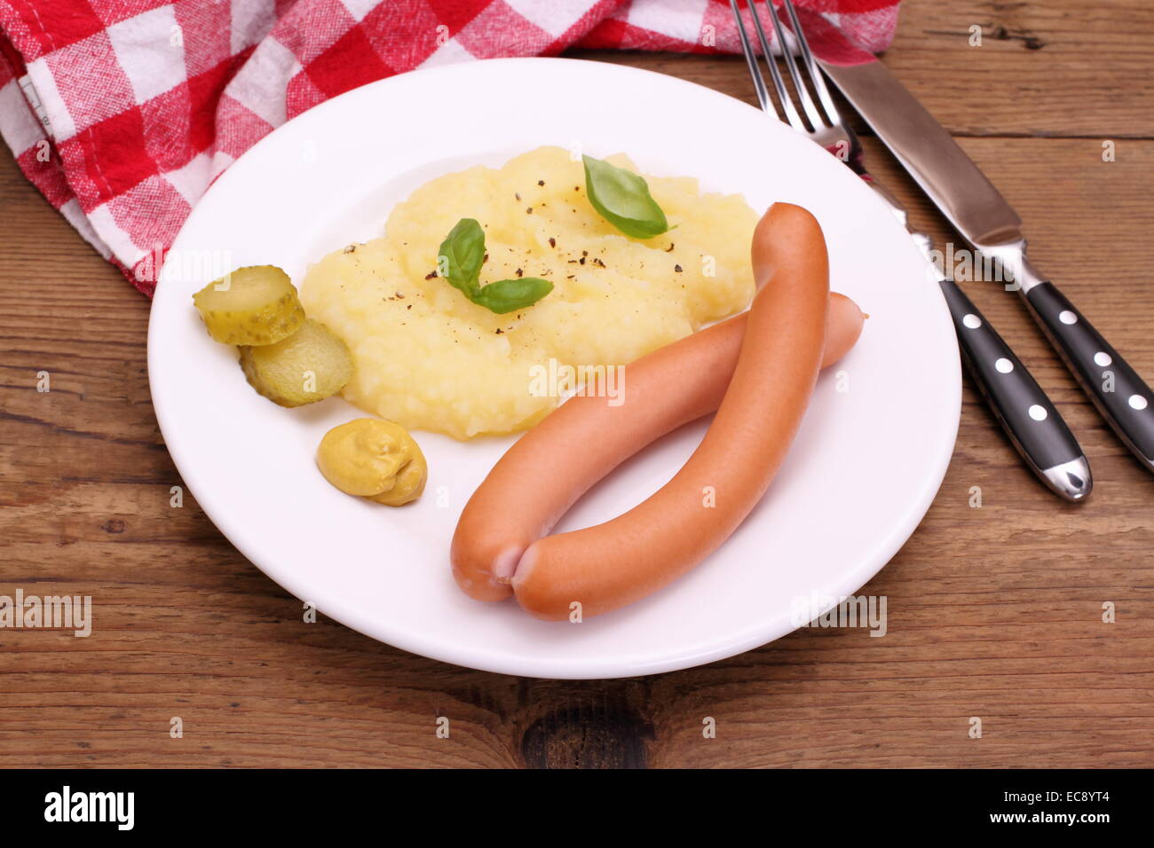Pair of sausage with mashed potatoes, mustard, top view Stock Photo