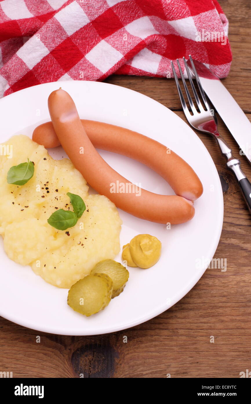Pair of sausage with mashed potatoes, mustard, top view Stock Photo