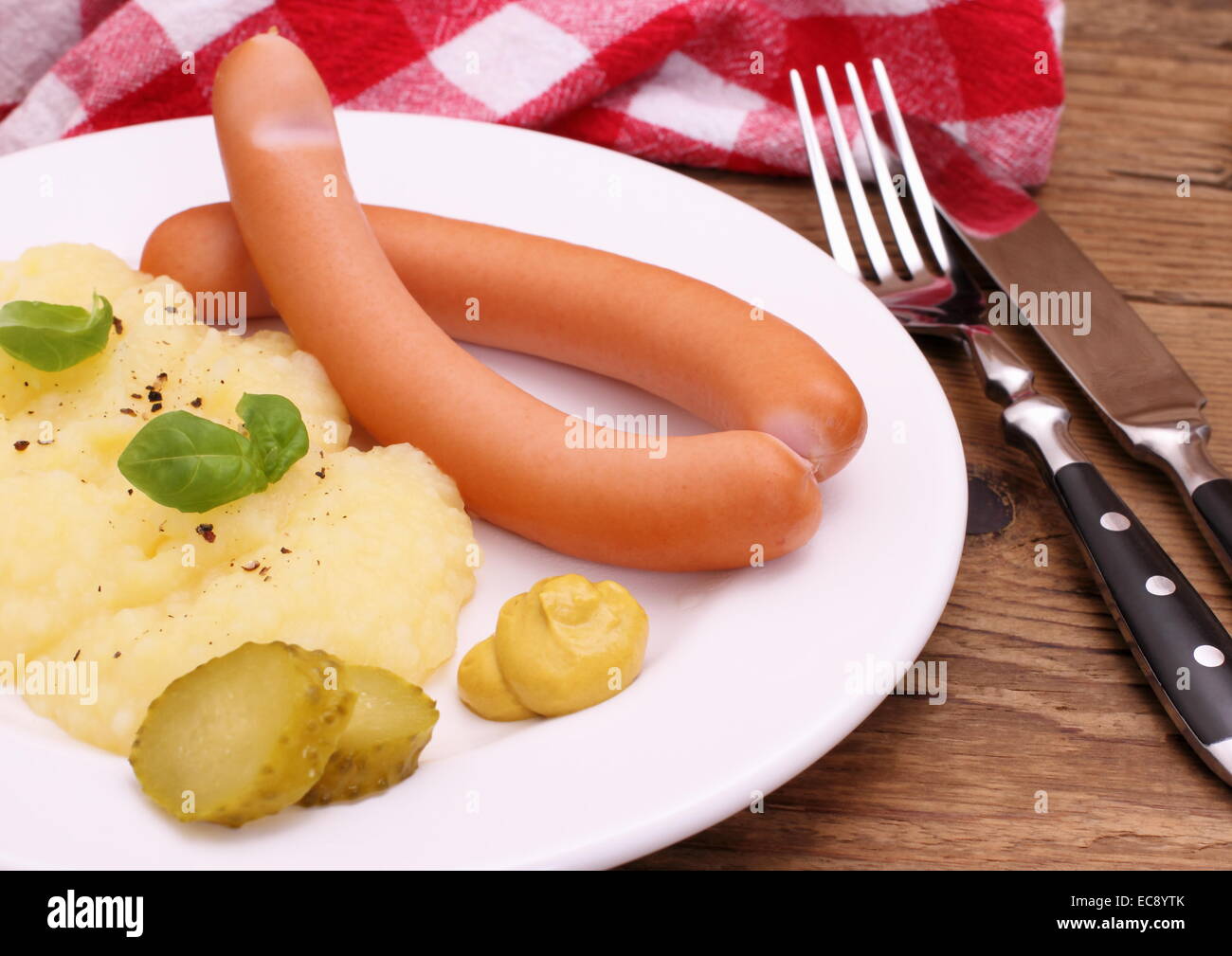 Pair of sausage with mashed potatoes, mustard, close up Stock Photo