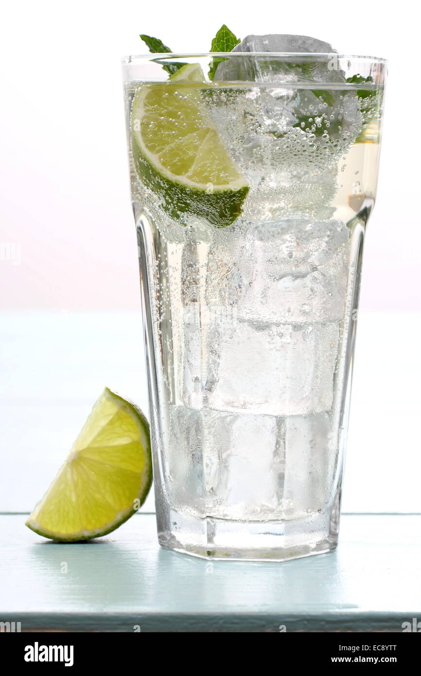 Hugo cocktail with lime, mint and ice cubes, close up Stock Photo