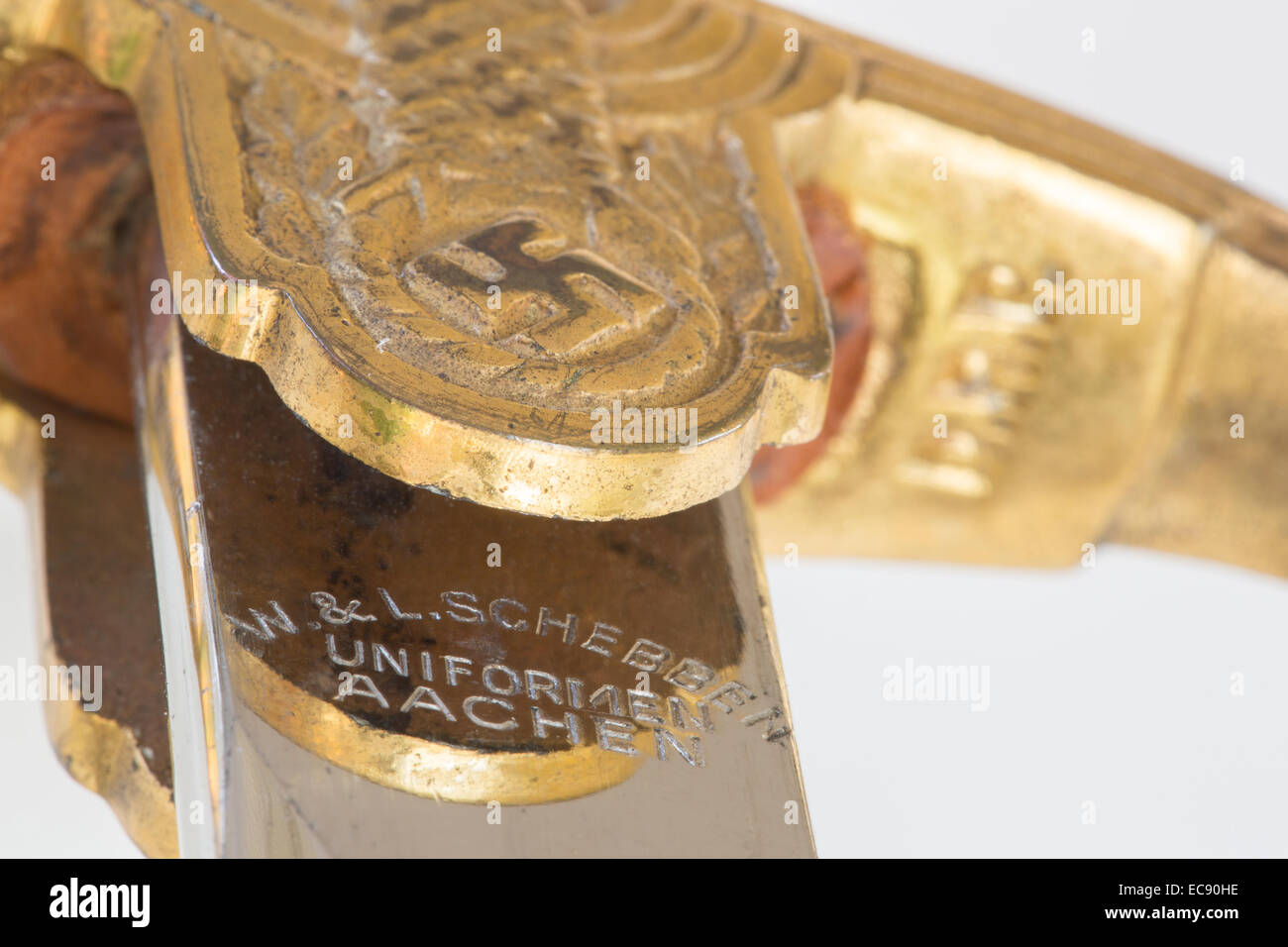 Close up detail of a 1940s WWII Nazi military dress sword showing W. & L. Schebben Uniforimen Aachen, the distributor's marking Stock Photo