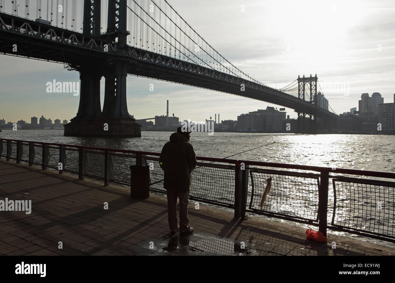 Man catching fish hires stock photography and images Alamy