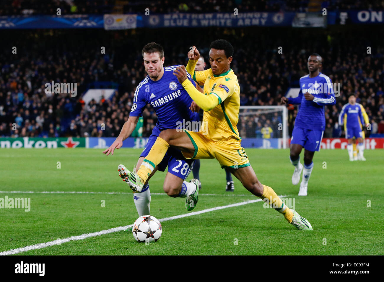 London, UK. 10th Dec, 2014. Andre Carrillo (Sporting), Cesar Azpilicueta (Chelsea) Football/Soccer : Andre Carrillo of Sporting and Cesar Azpilicueta of Chelsea battle for the ball during the UEFA Champions League Group Stage match between Chelsea and Sporting Clube de Portugal at Stamford Bridge in London, England . Credit:  AFLO/Alamy Live News Stock Photo