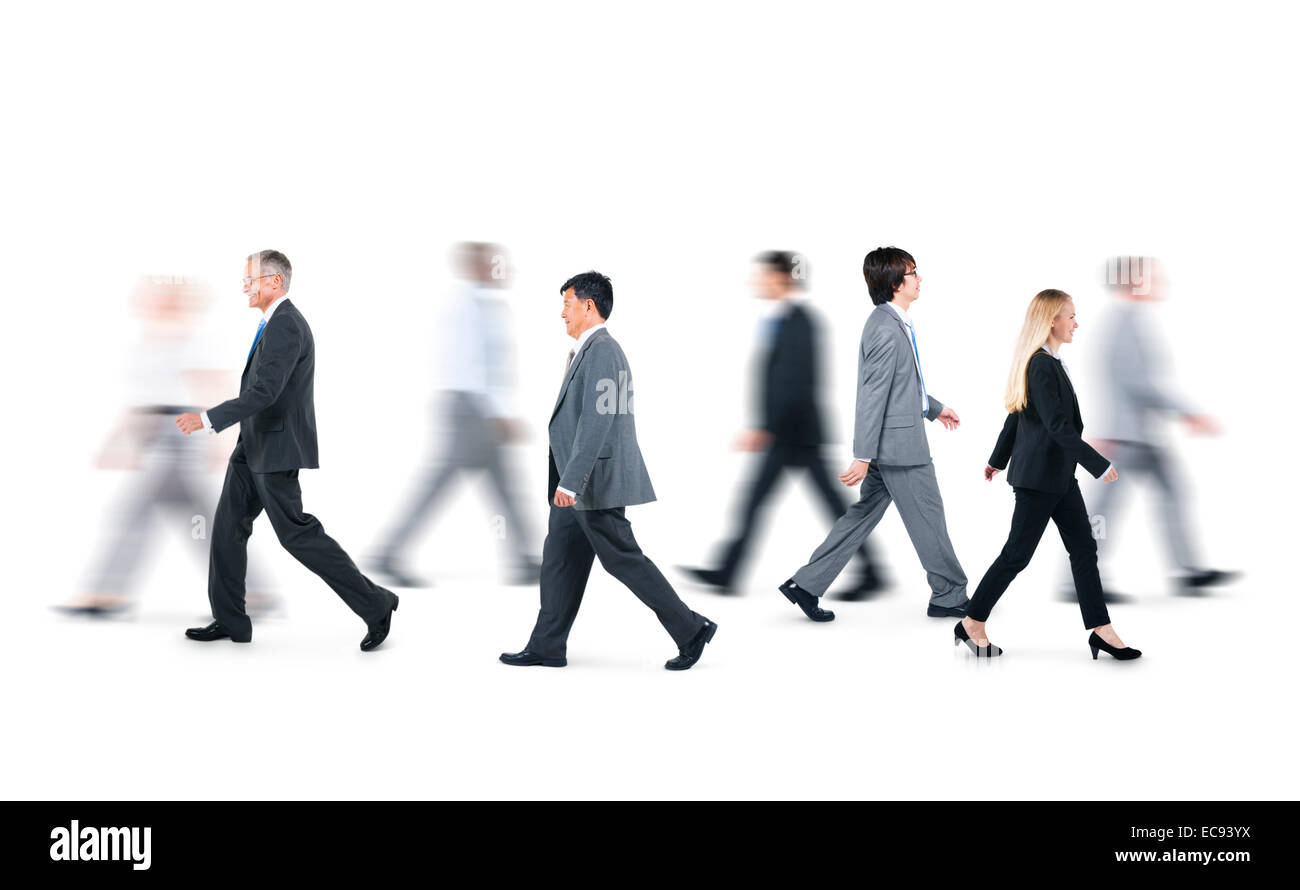 Group of Business People Walking in Different Directions Stock Photo
