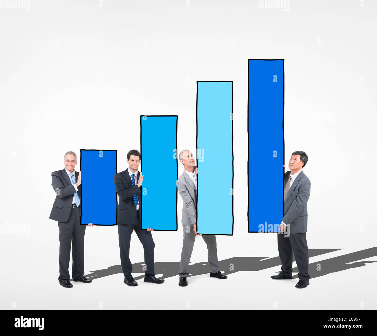 Business People Holding Bar Graph Stock Photo