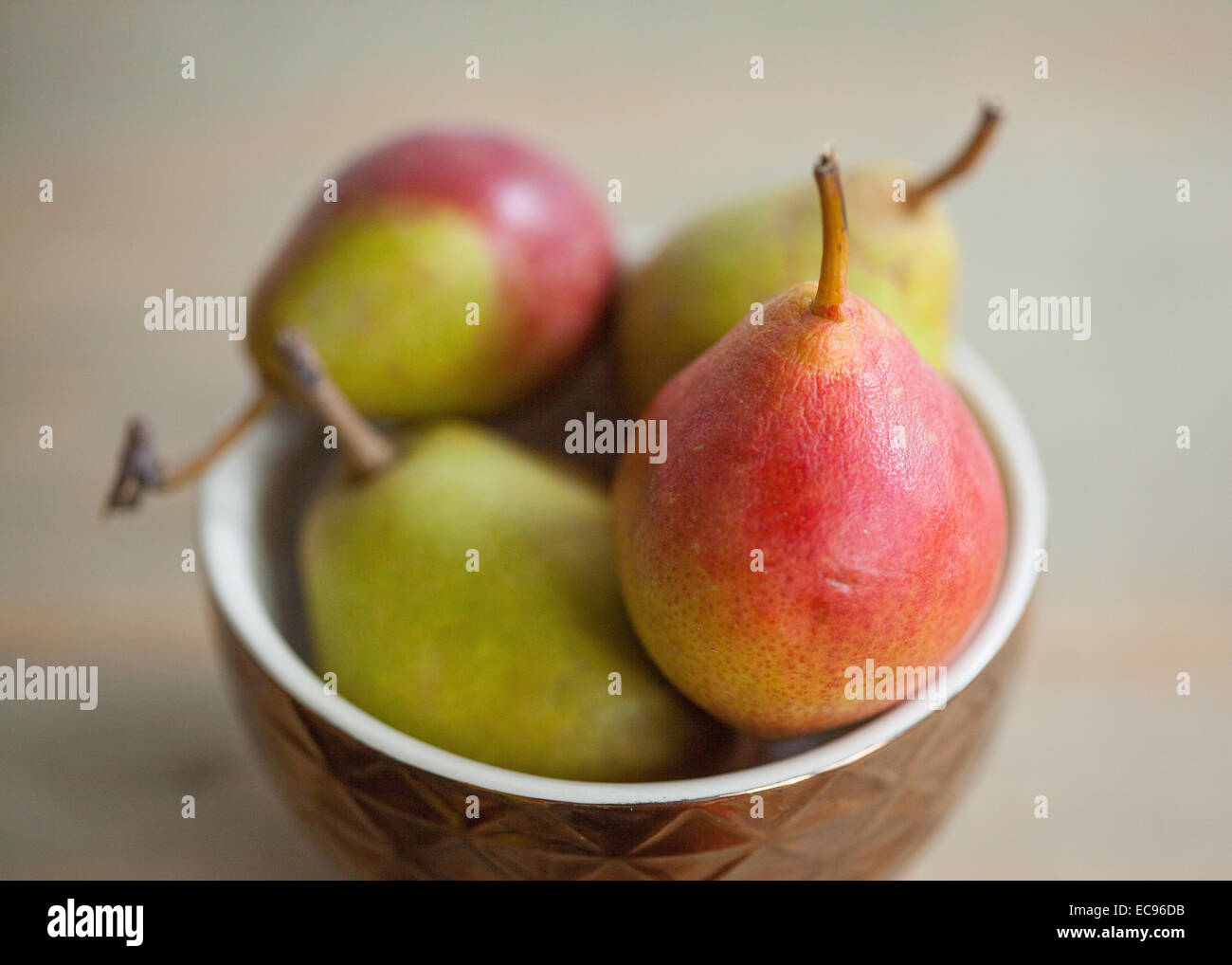 Macro of small pears in a bowl Stock Photo