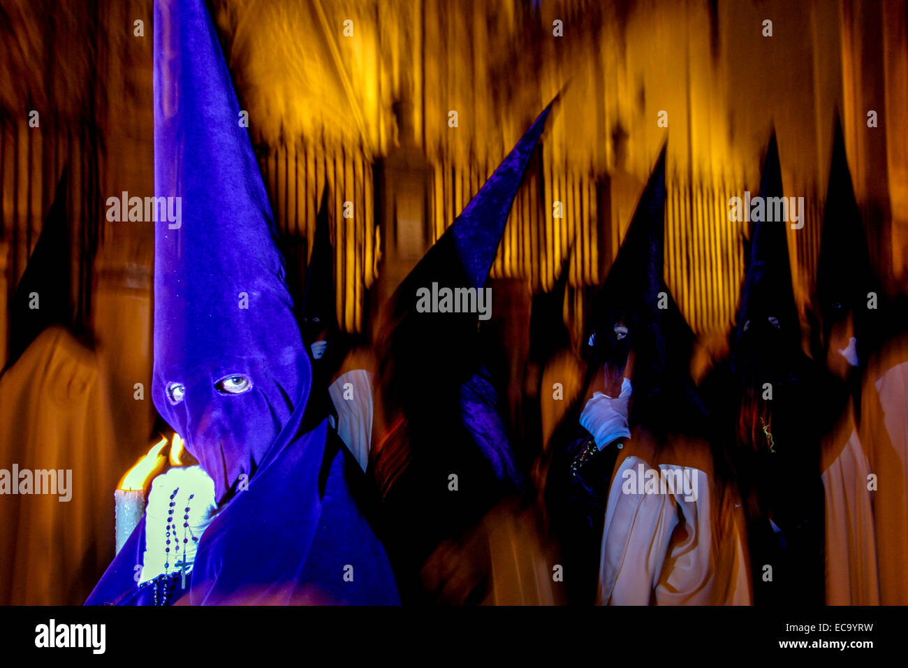 Semana Santa Holy Week by Night, At The Cathedral Fiesta. Celebration in the street Seville. Andalucia, Southern Spain Easter world Stock Photo