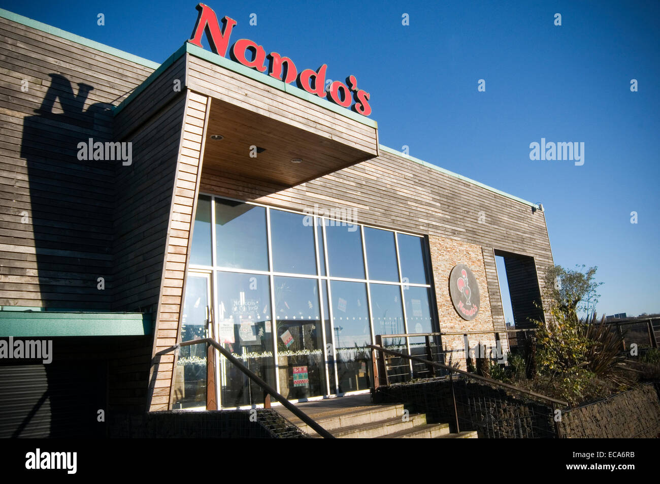Nando's Nandos Portuguese chicken restaurant restaurants chain theme chained Stock Photo