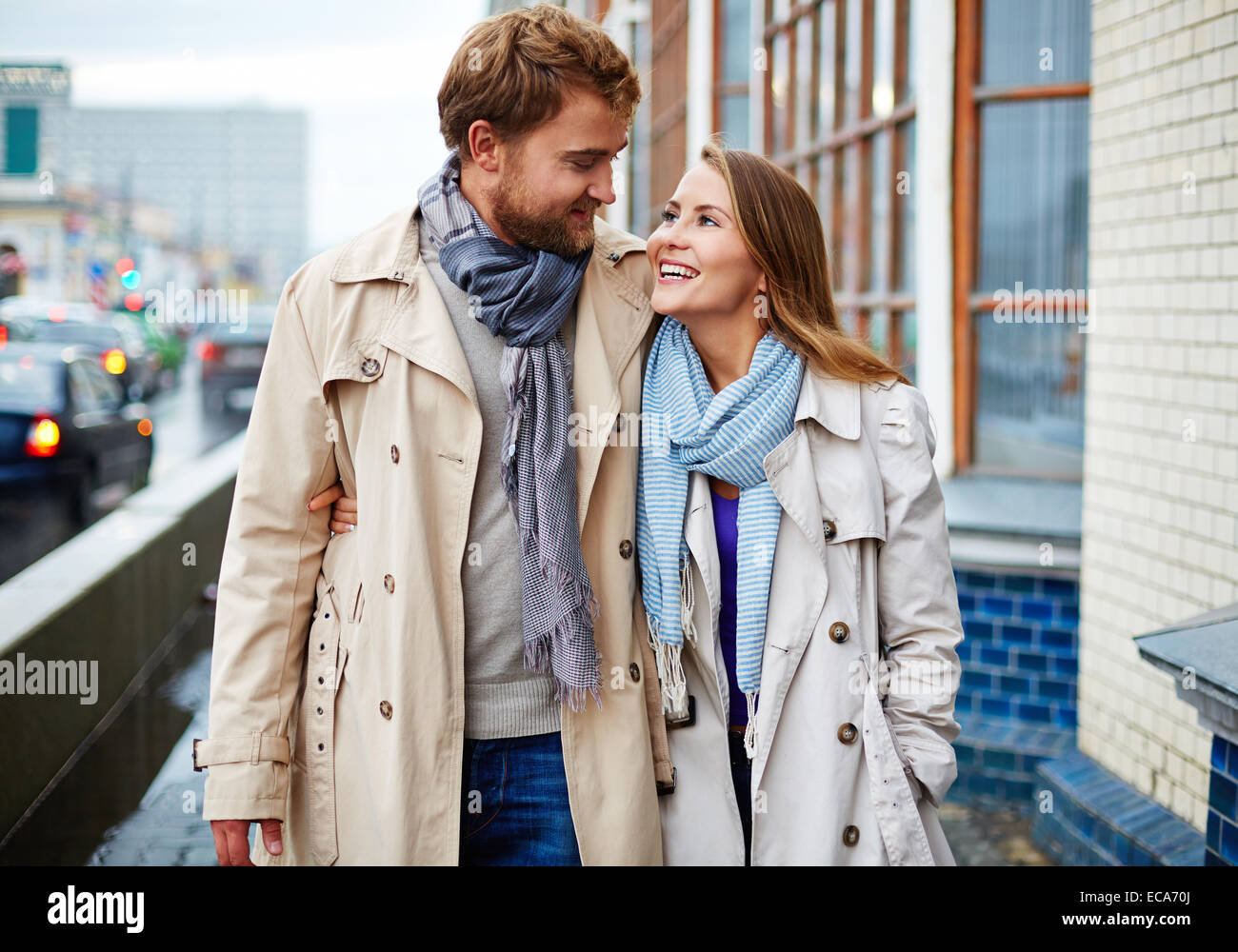 Couple in trench coats hi-res stock photography and images - Alamy