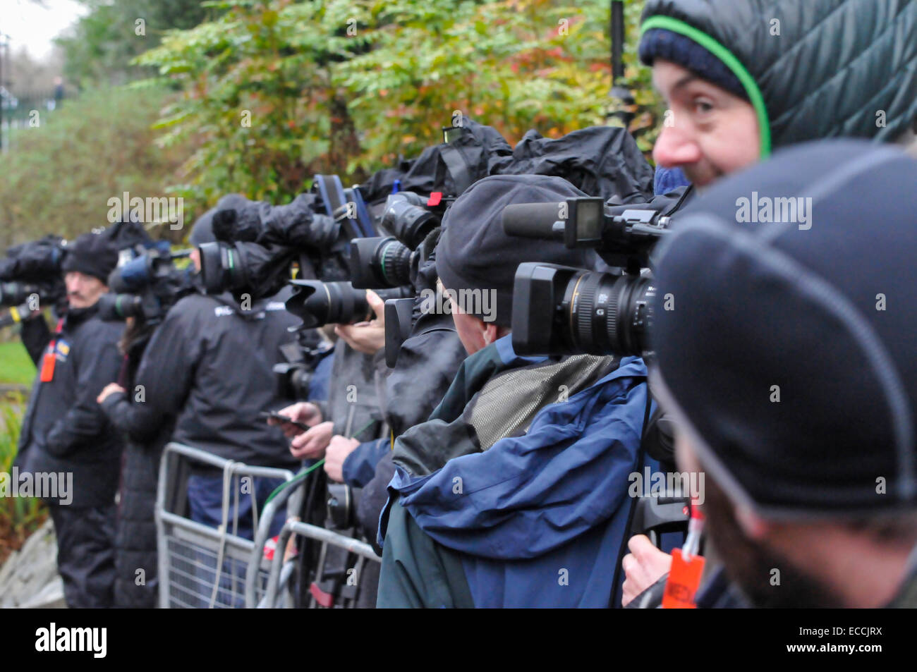 Belfast, Northern Ireland, UK. 11th December, 2014. Television camermen and photographers wait for the arrival of David Cameron and Enda Kenny Credit:  Stephen Barnes/Alamy Live News Stock Photo