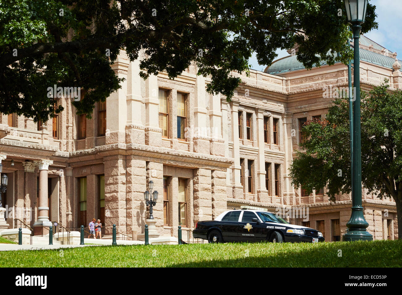 State Capitol Building, Austin, Texas, USA with State Trooper vehicle parked outside. Stock Photo