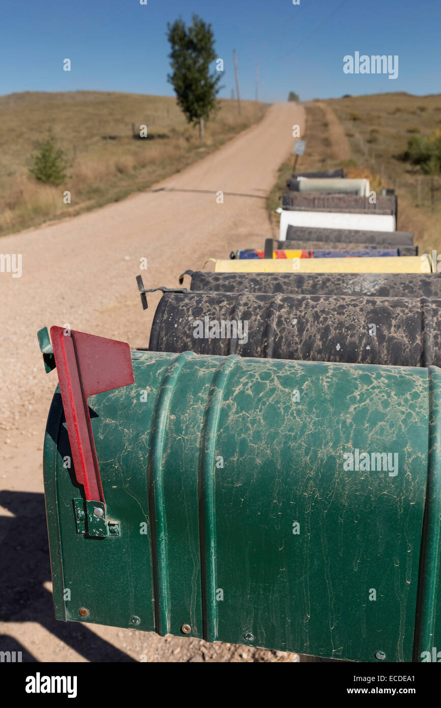 Line of Mailboxes (letterboxes) on Rural Dirt Road, South Dakota, USA Stock Photo