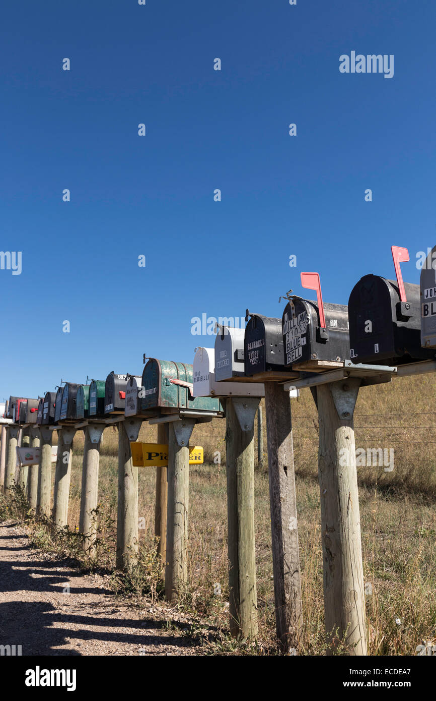 Line of Mailboxes (letterboxes) on Rural Dirt Road, South Dakota, USA Stock Photo