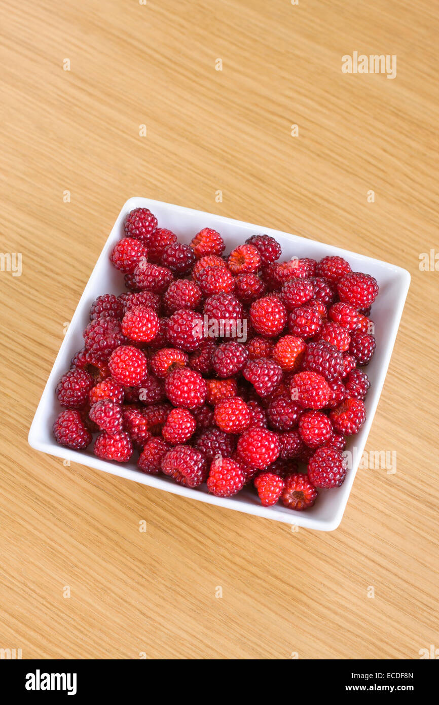 japanese-wineberries-in-dish-rubus-phoenicolasius-stock-photo-alamy