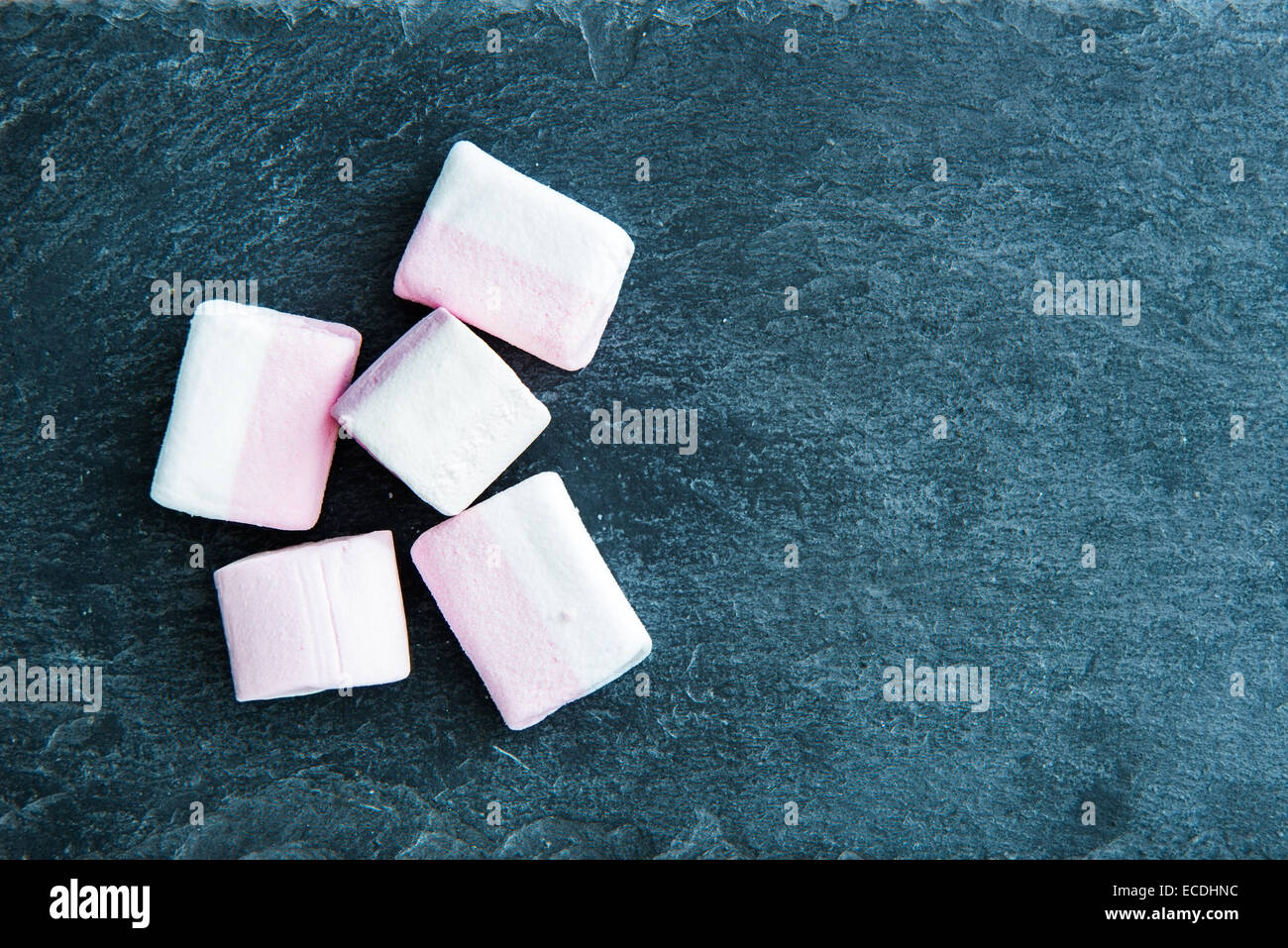 Closeup on marshmallow on stone substrate Stock Photo