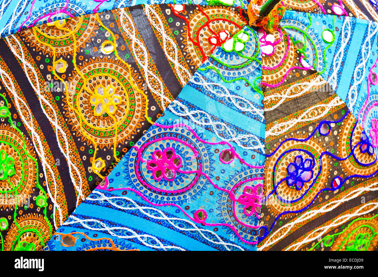 Part of an umbrella made from colorful indian cloth Stock Photo