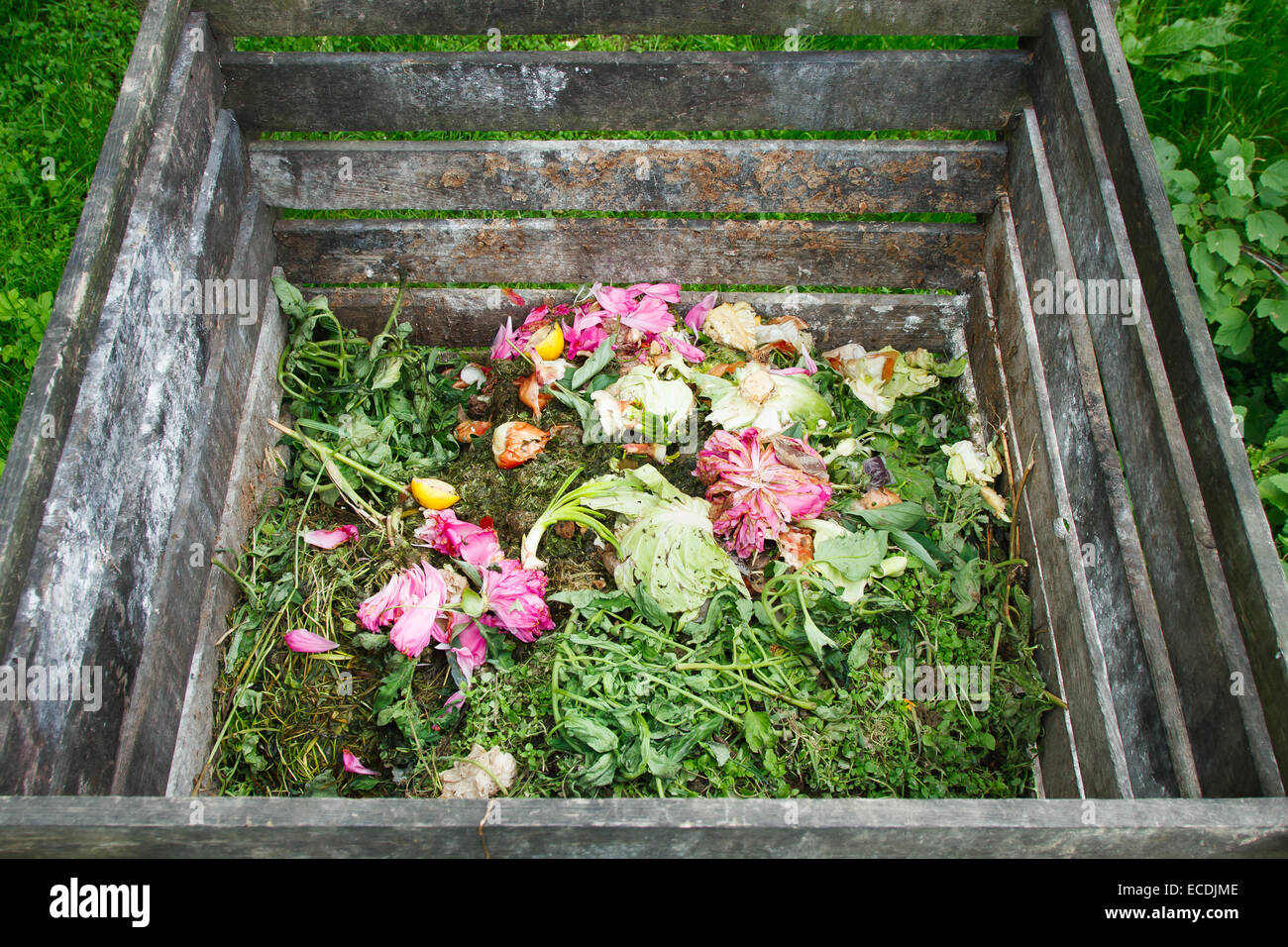Compost bin in the garden Stock Photo