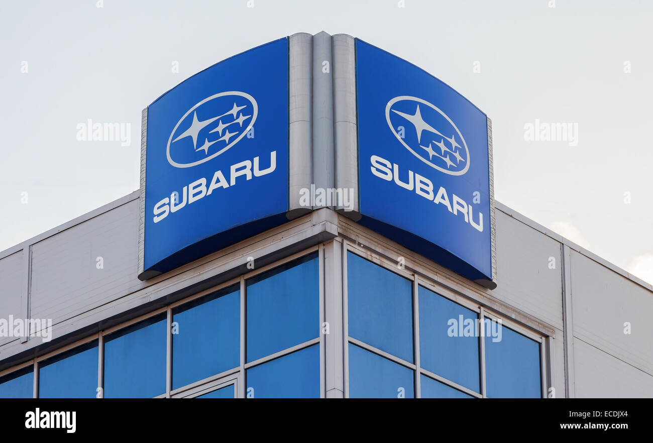 Subaru dealership sign against blue sky Stock Photo Alamy