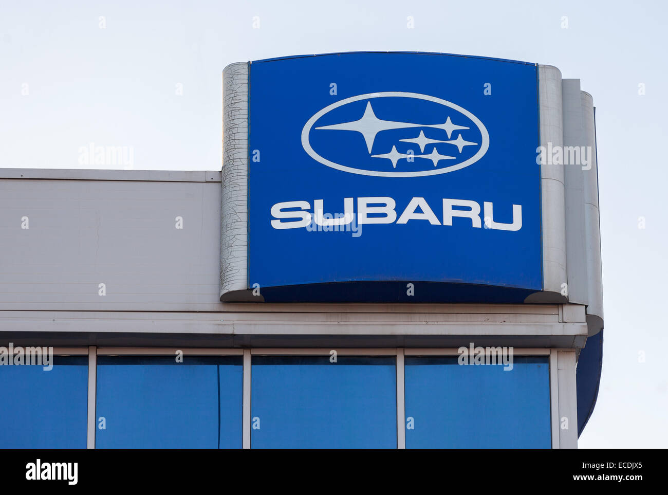 Subaru dealership sign against blue sky Stock Photo Alamy