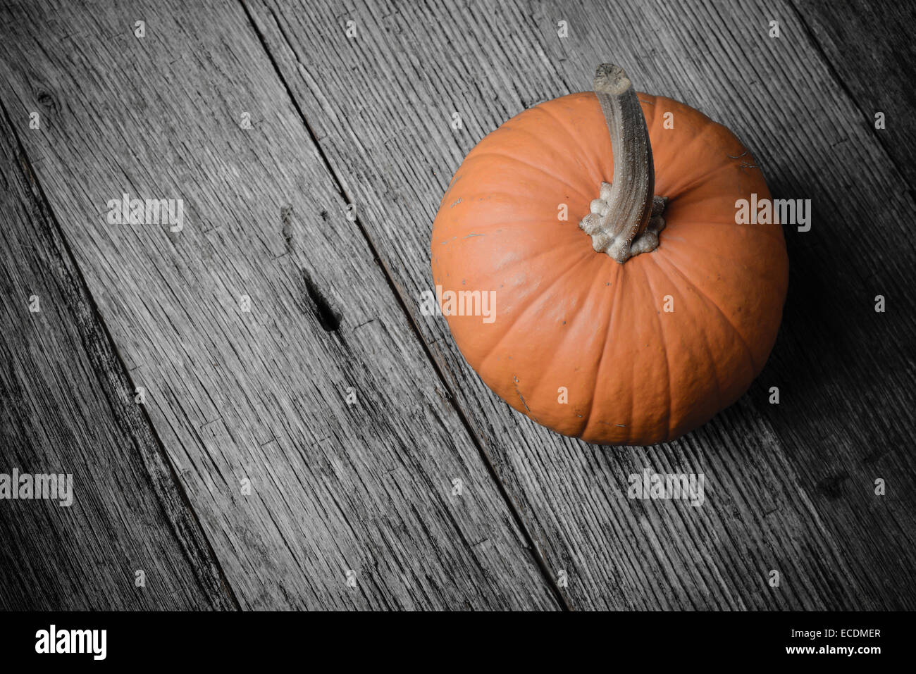 Pumpkin on Rustic Wood Background Stock Photo - Alamy