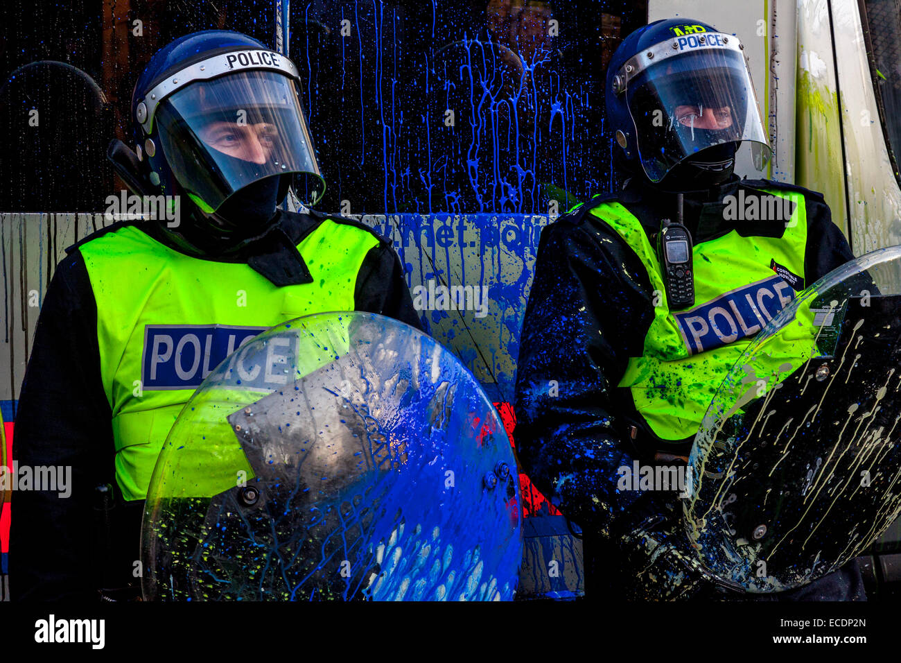 Metropolitan Police Officers Covered In Paint During The Student Tuition Fee Protests, Parliament Square, London, England Stock Photo