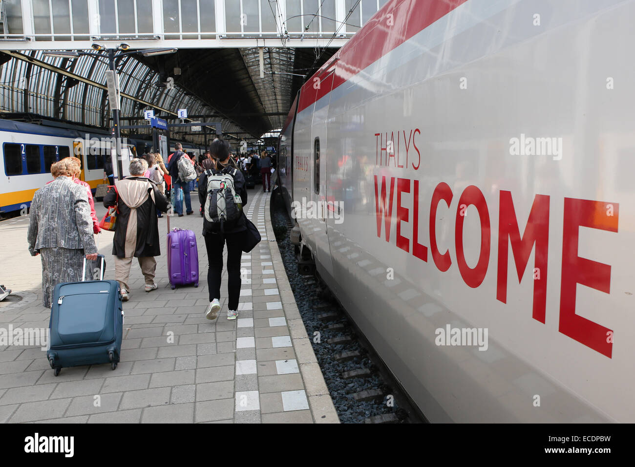 europe leaving passengers rail station thalys train travellers Stock Photo