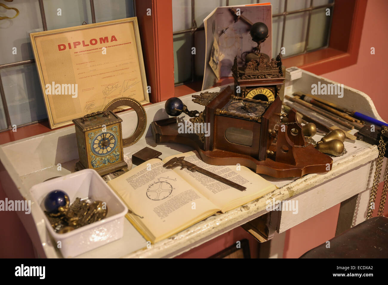vintage clock repair table Dutch Holland Stock Photo