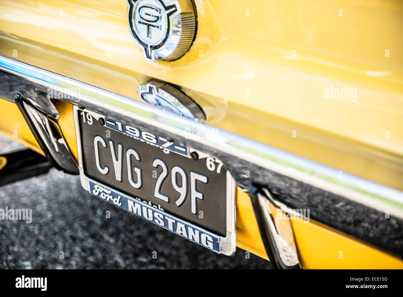 Yellow Ford Mustang, GT, number plate Stock Photo