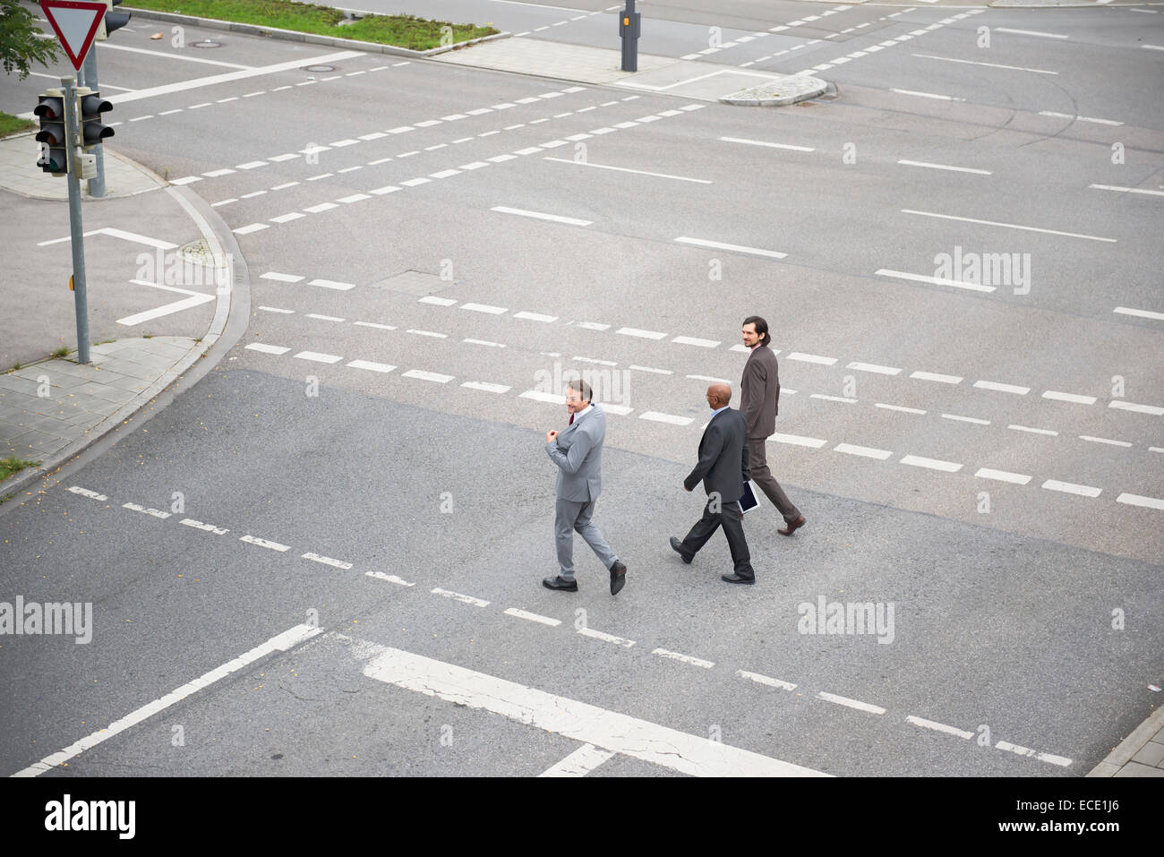 Teamwork businessmen Cooperation crossing road Stock Photo