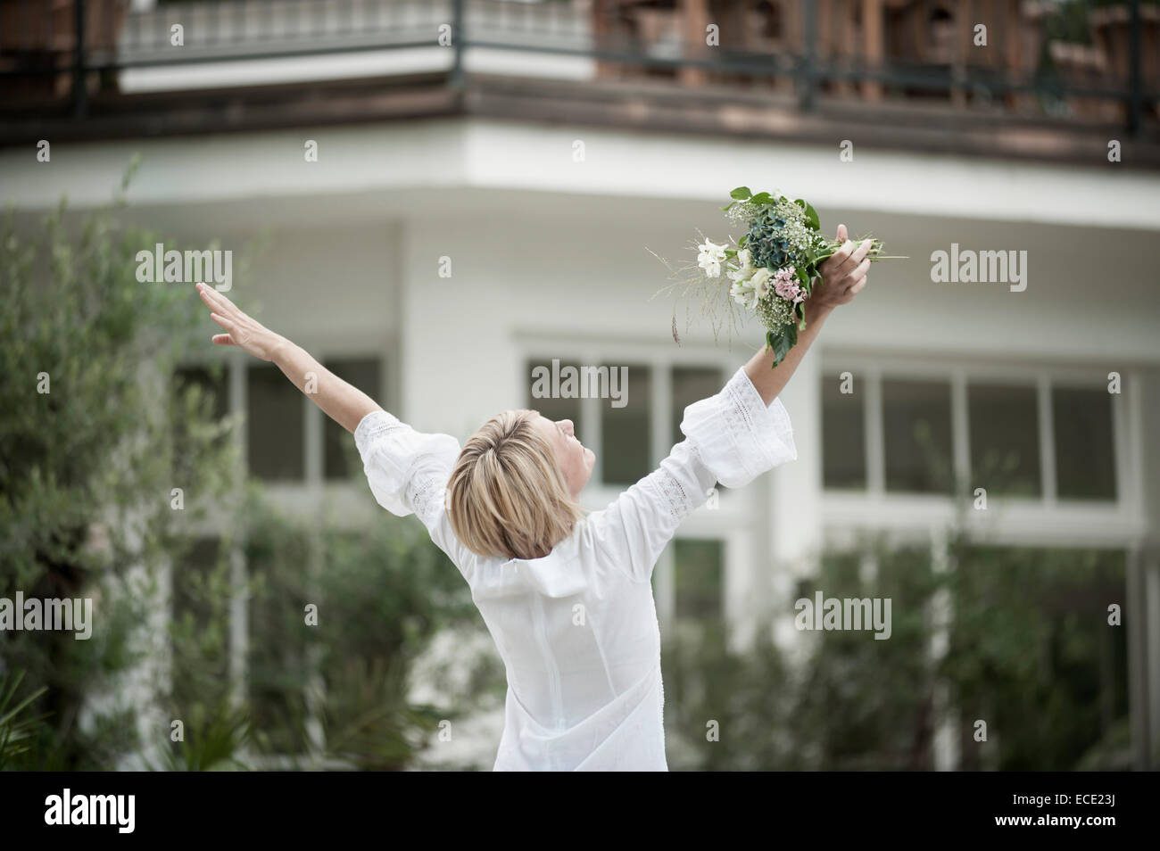 Blonde Woman Dancing Rear View High Resolution Stock Photography and ...