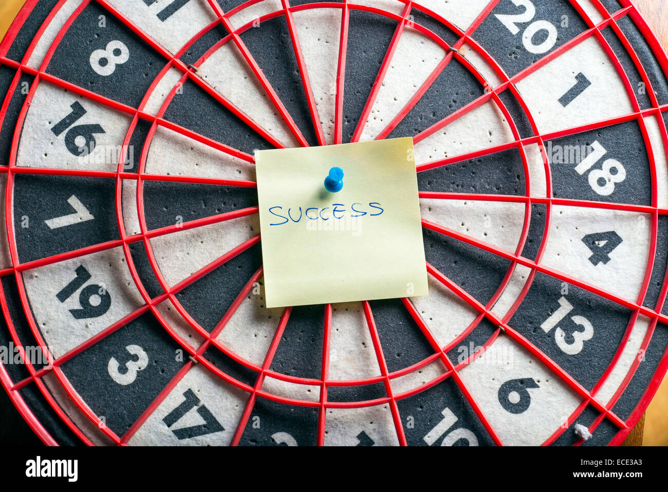 the word success in the center of a dartboard Stock Photo