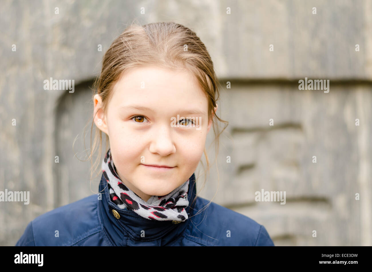 Portrait of a girl with a Japanese stone on background Stock Photo Alamy