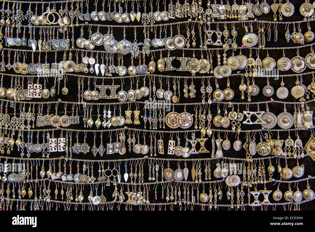 Silver and gold earrings for sale, Sana'a, Yemen Stock Photo